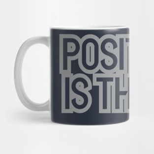 positivity is the key Mug